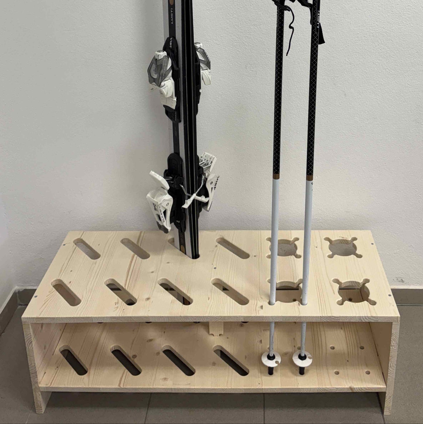 Combined wooden stand for skis and poles