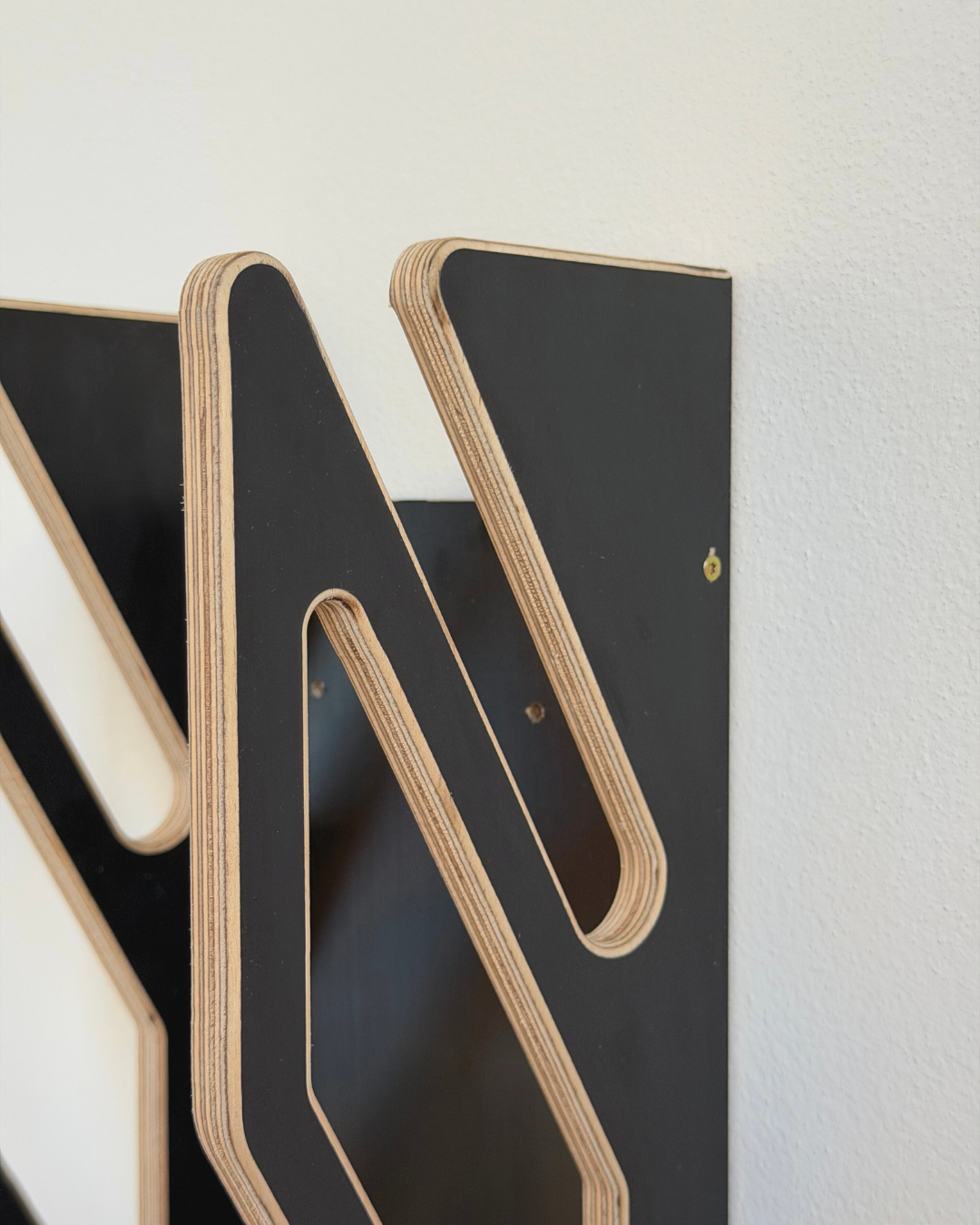 Wall holder for 2 snowboards or skateboards