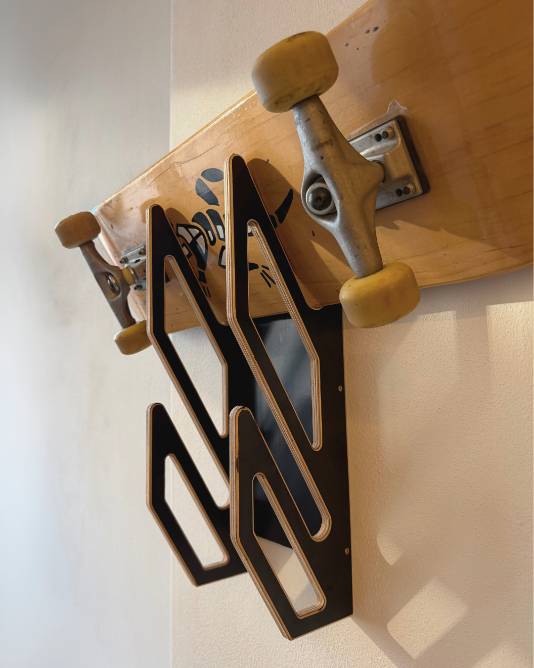 Wall holder for 2 snowboards or skateboards